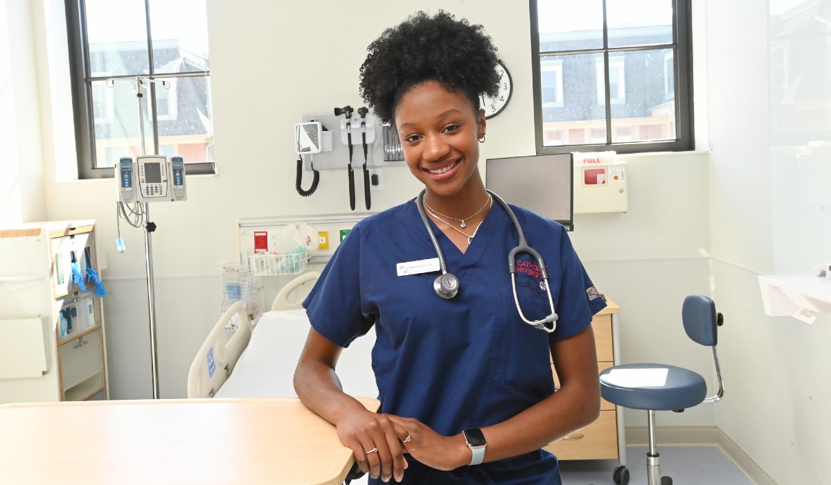 Student nurse examining another student