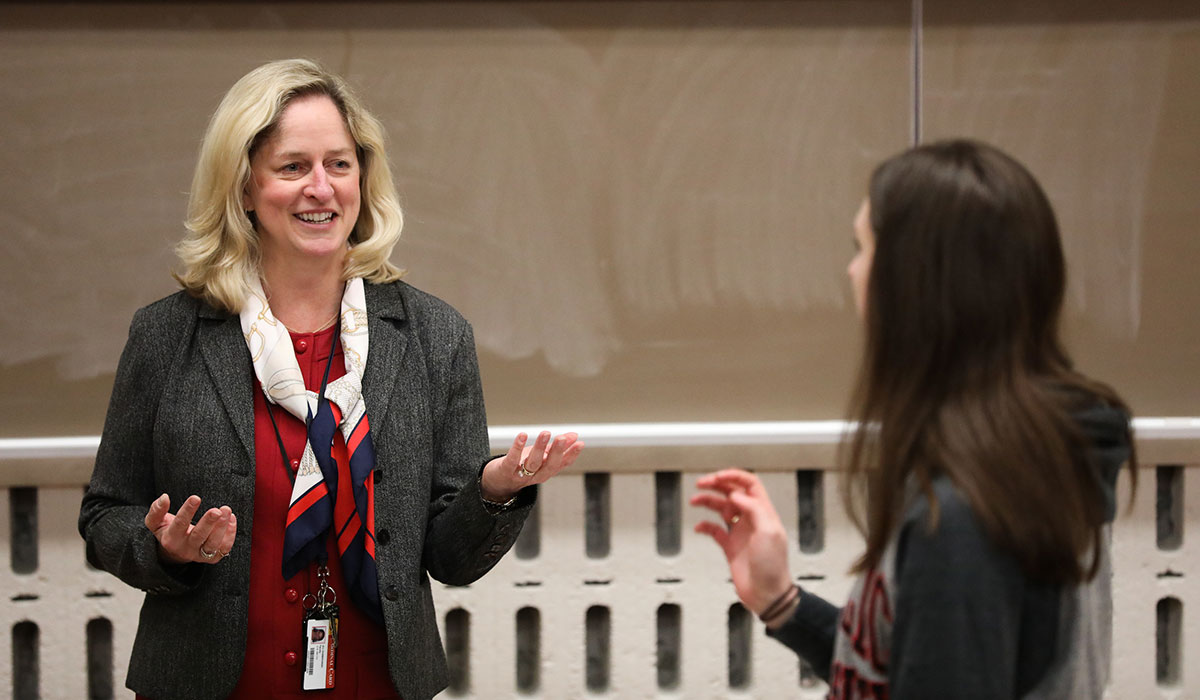 Nursing professor with student