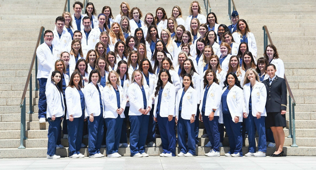 Students standing on steps