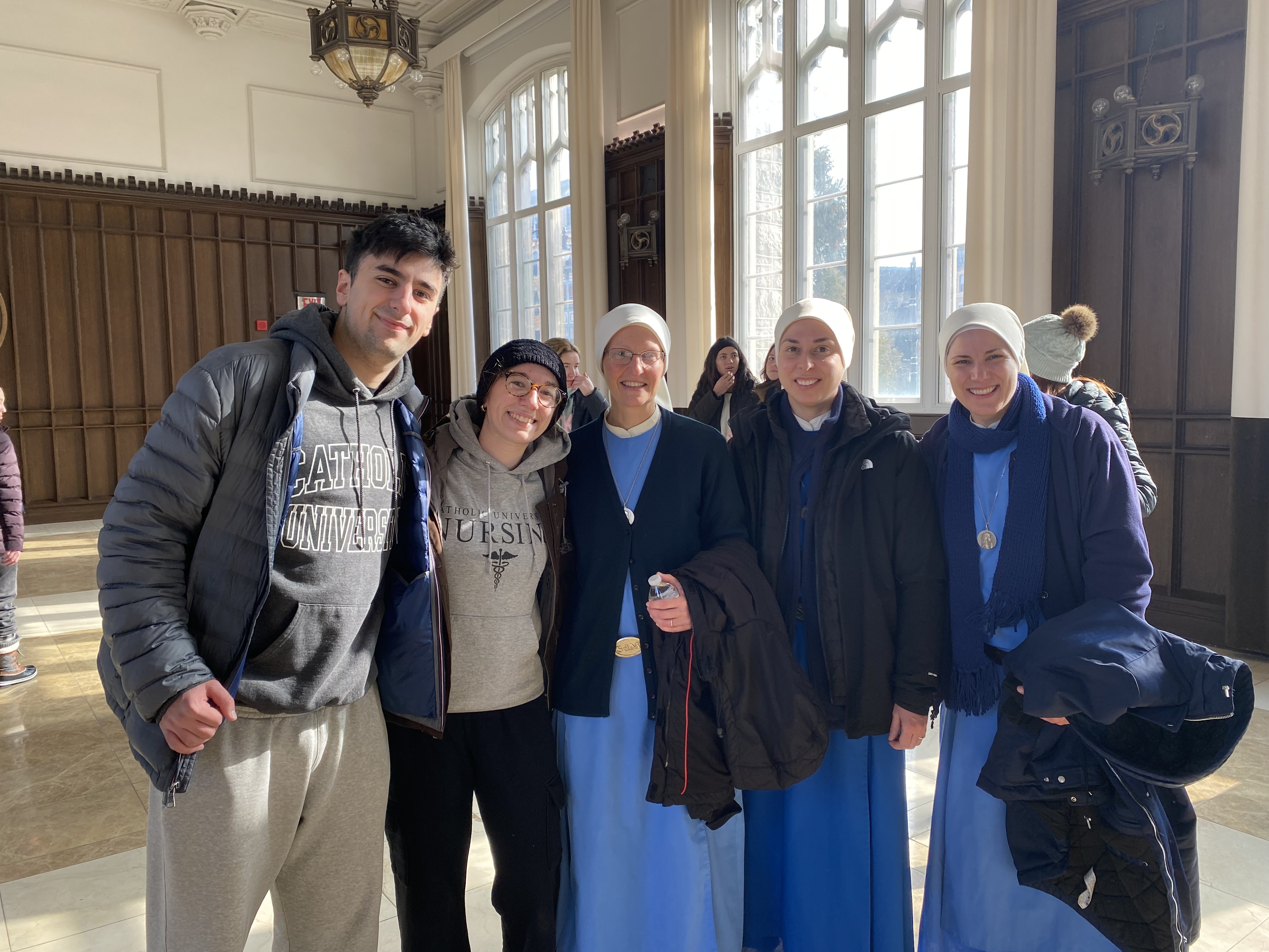 Group Photo with Lizzy Christopher: Christopher Mastoros, Elizabeth Mastoros, Sisters Anunciata Freitag and Chiara Orsini, and another sister from Catholic University.