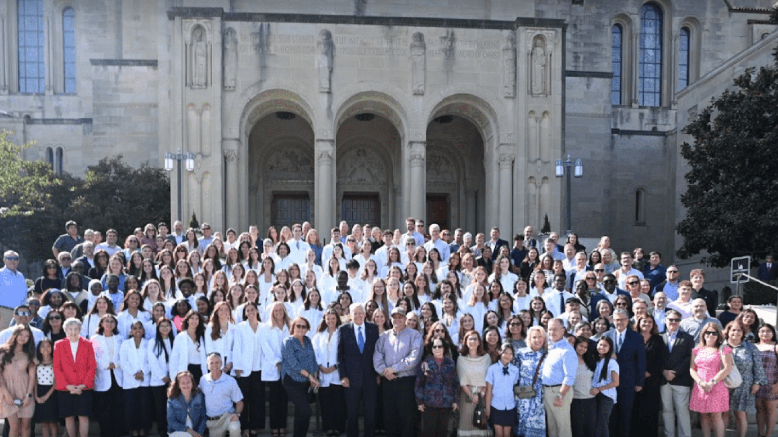 Photo of the Blessing of the Hands ceremony with the crowd infront of the Basilica.