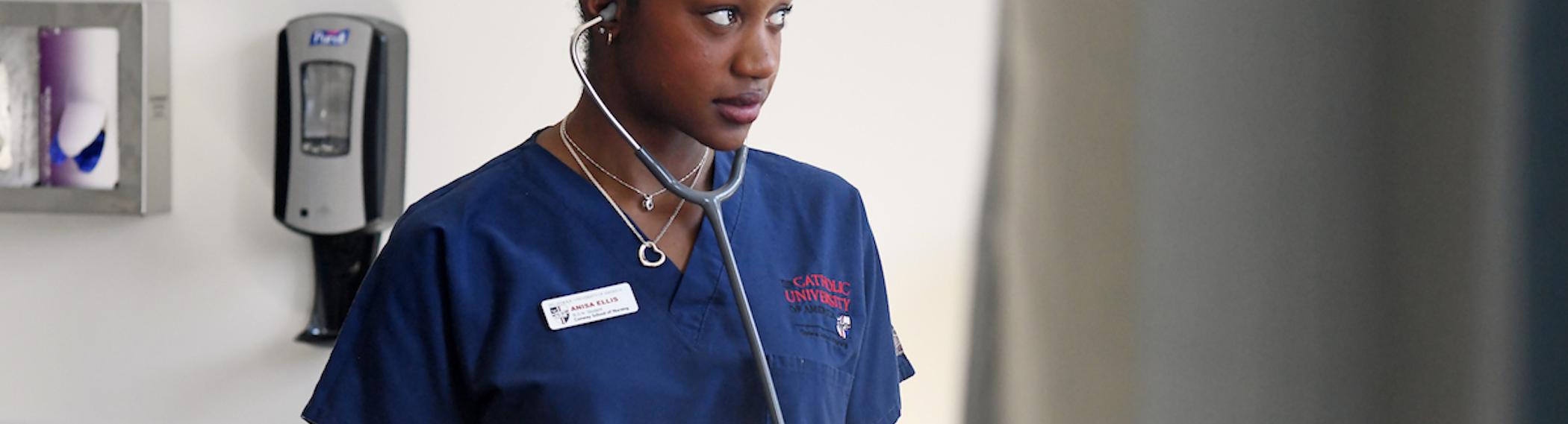 a conway student in her scrubs and stethescope