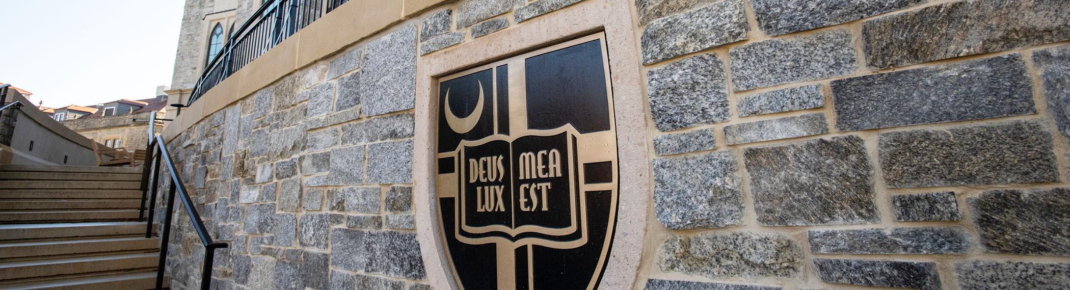 Catholic University shield on Conway Building.