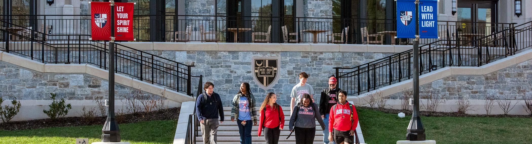 Students walking outside Conway Building.