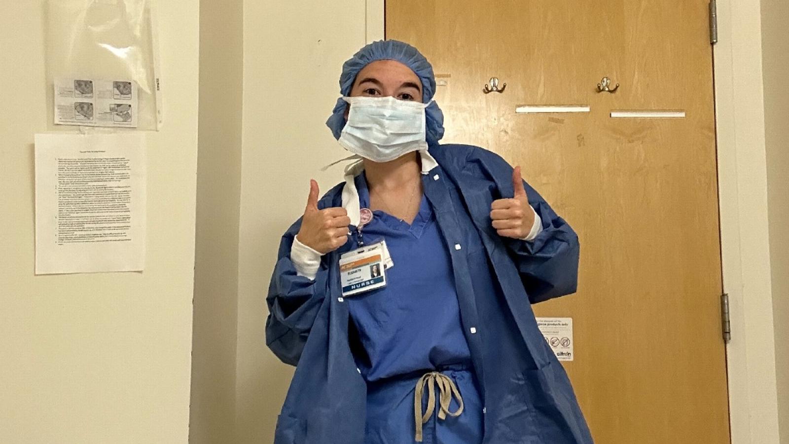 elizabeth in her labor and delivery scrubs at the hospital