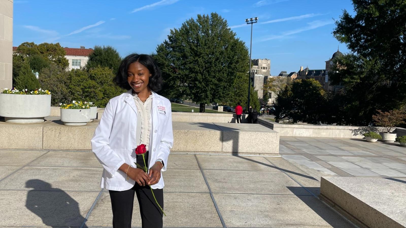 anisa in her white nursing gown