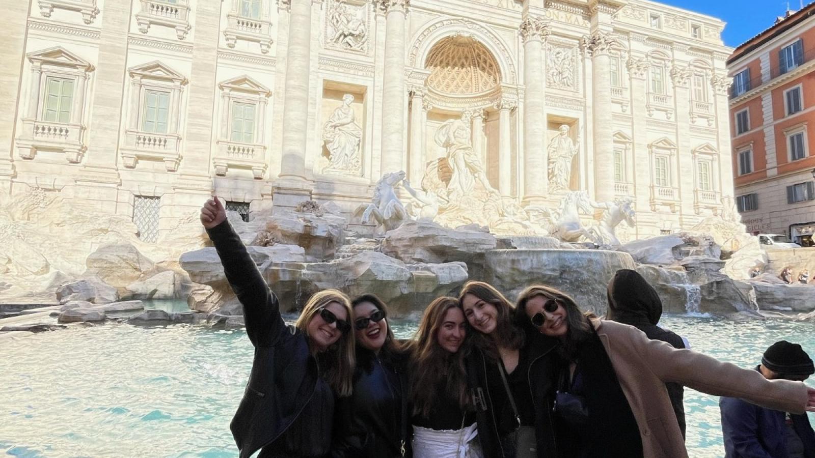 elizabeth with friends at the trevi fountain in rome