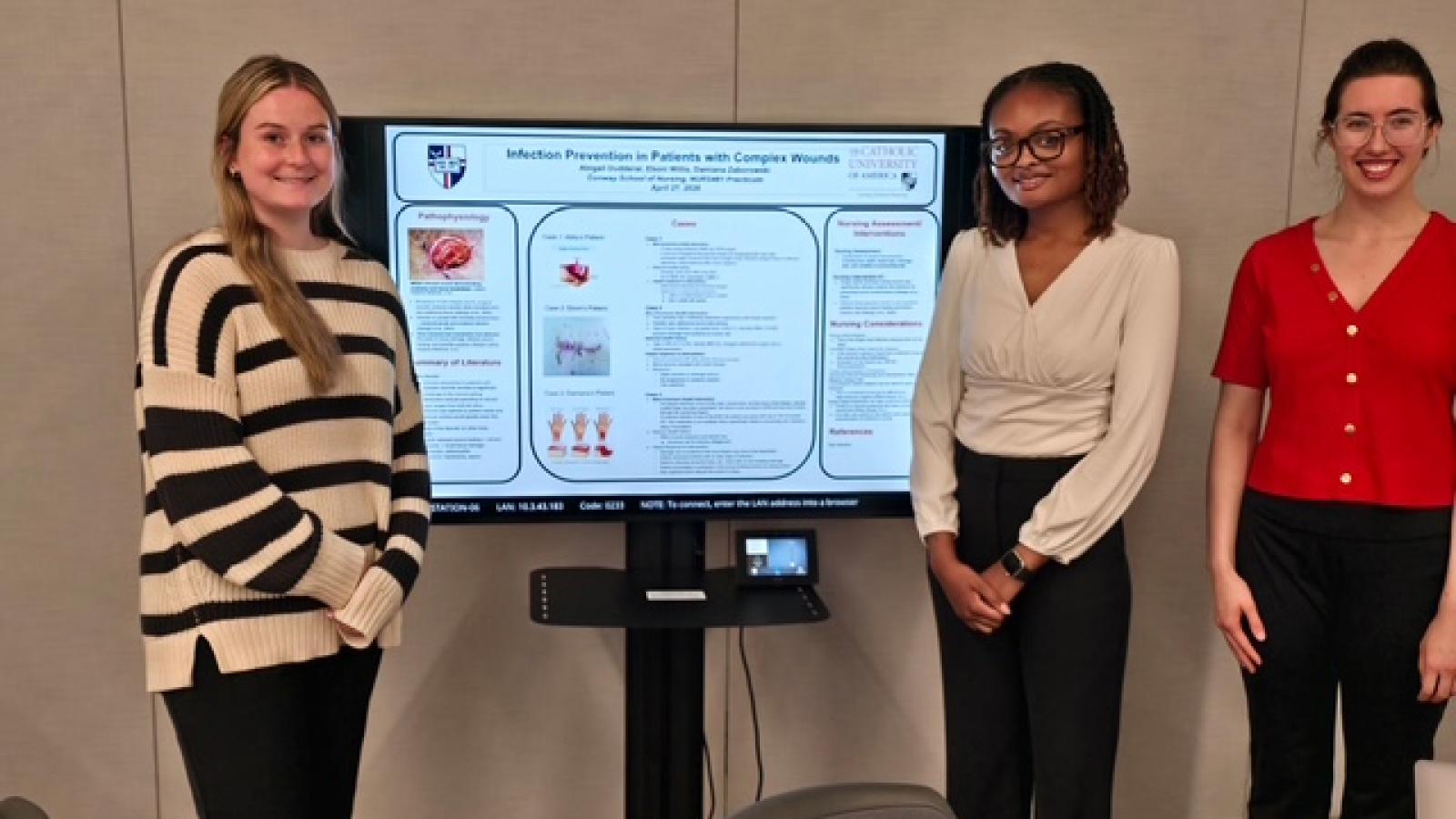 Presentation from 2026 Senior Practicum Presentations, featuring three female students.