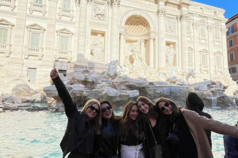 elizabeth with friends at the trevi fountain in rome