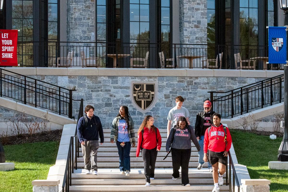 Students walking outside Conway Building.