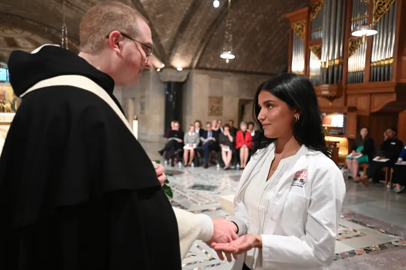 In a moving ceremony reflecting the higher purpose of healthcare, 84 junior nursing students at Catholic University’s Conway School of Nursing received the traditional Blessing of Hands on Oct. 18.The annual ceremony acknowledges the sacred nature of the nursing profession and reflects the University's commitment to cultivating healthcare professionals who provide compassionate, holistic care in the spirit of Jesus Christ's healing ministry. 