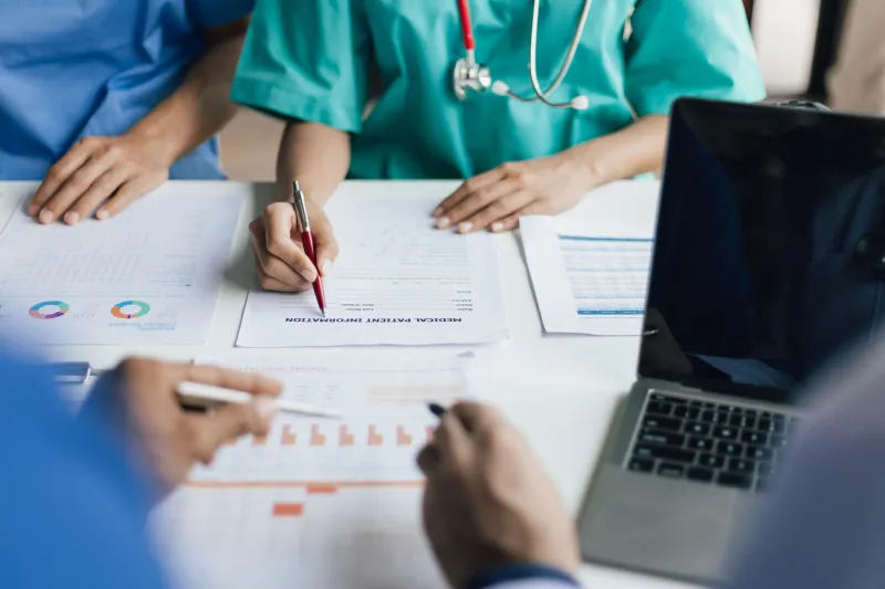 hospital meeting examining data