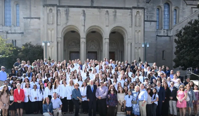 Photo of the Blessing of the Hands ceremony with the crowd infront of the Basilica.