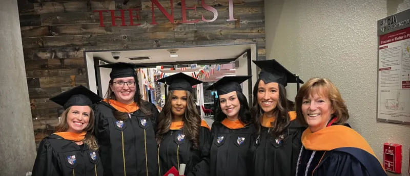 Photo of the inaugural MSN graduates during the December 2025 Commencement. 