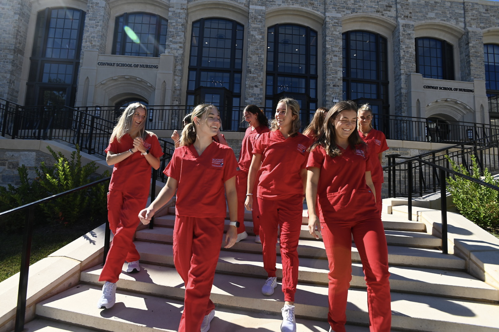 Students standing on steps